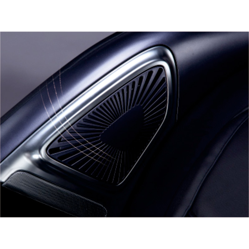 Närbild av de sofistikerade högtalarna på massagestol Santé Shiri 3D, med en modern design och glänsande finish.